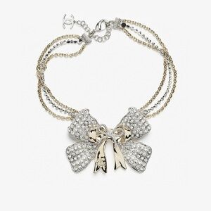 Elegant Gold and Silver Bow Necklace